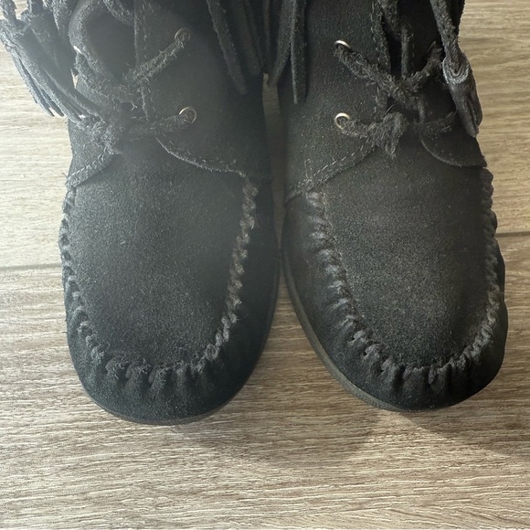 Minnetonka Black Lace-Up Fringe Wedge Booties - Picture 2 of 15